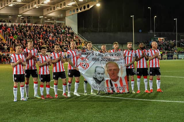 Derry City players pay tribute to the late Vinny Cunningham at the Ryan McBride Brandywell Stadium on Friday evening. Photograph: George Sweeney