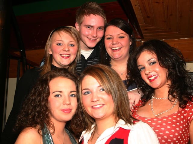 Gemma McGinty centre celebrates her 18th with a group of friends having a good time at the party in the Linehall. 2583/dd : Parties and nights out in Derry and Donegal in February 2006.