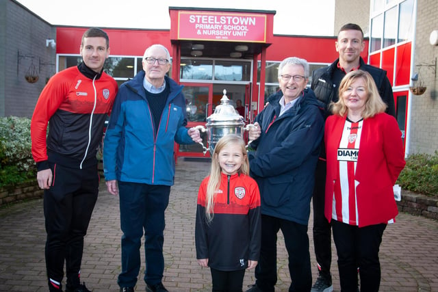 FAI CUP AT STEELSTOWN. . . . .Derry City FC players Shane and Patrick McEleney with former teaching staff at Steelstown PS, Eunan O’Donnell and Charlie McMonagle, who both taught the duo during their days at Steelstown PS. Included is Mrs. Siobhan Gillen, Principal and Patrick’s daughter Sorlaith. (Photos: Jim McCafferty Photography)