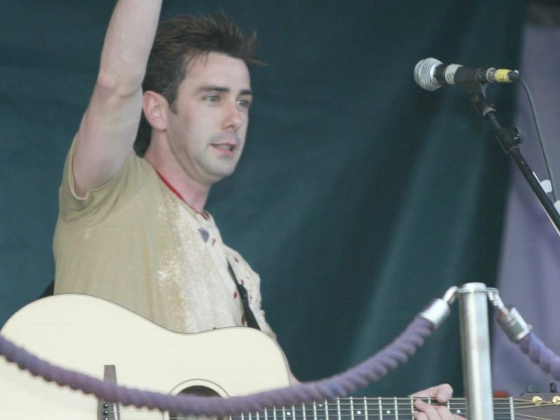 Mickey Harte acknowledges the large crowd when he appeared at the open air concert in Strabane. (0107JB111)