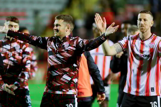 McEleney brothers Patrick and Shane celebrate in front of the Derry City fans at Dalymount Park.