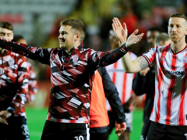 McEleney brothers Patrick and Shane celebrate in front of the Derry City fans at Dalymount Park.