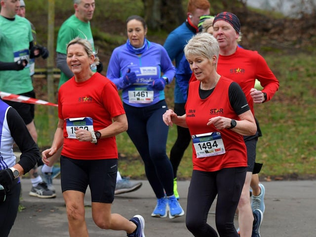 STAR running club’s Marcella McCorkell (1569), Bernadette McNobola (1494) and Jonathan Hegarty make their way through St Columb’s Park during the Bentley Group Derry 10 Miler road race on Saturday morning. Photo: George Sweeney. DER2310GS – 099