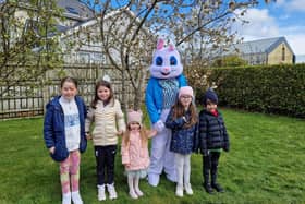 The Williamson and Kelly children with the Easter Bunny at the Barrack Hill Easter Trail on Monday.