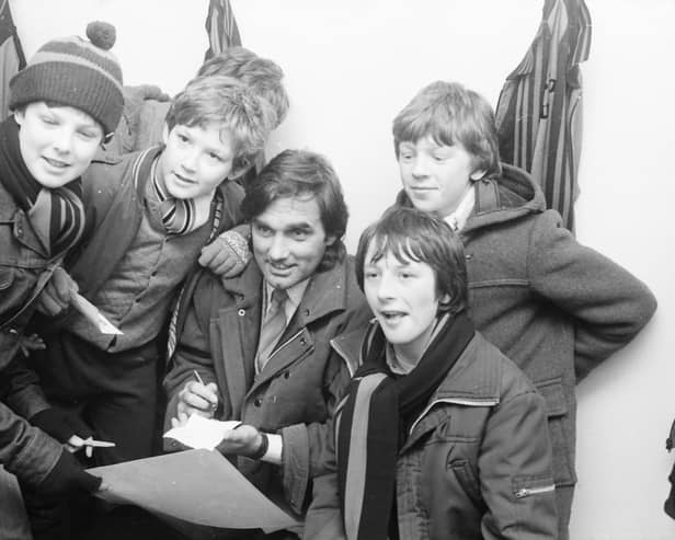George Best meets some young fans as Tobermore F.C.'s grounds back in 1984.