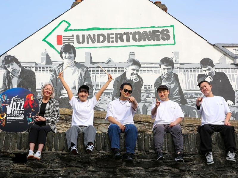 Council Jazz Festival Coordinator Andrea Campbell with South Korean Jazz band Odd Meter Fairy and the JazzysCredit © Lorcan Doherty