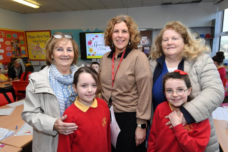 Steelstown Vice Principal Mrs. O'Neill welcoming Eimear and Evangeline's grandparents to the school.