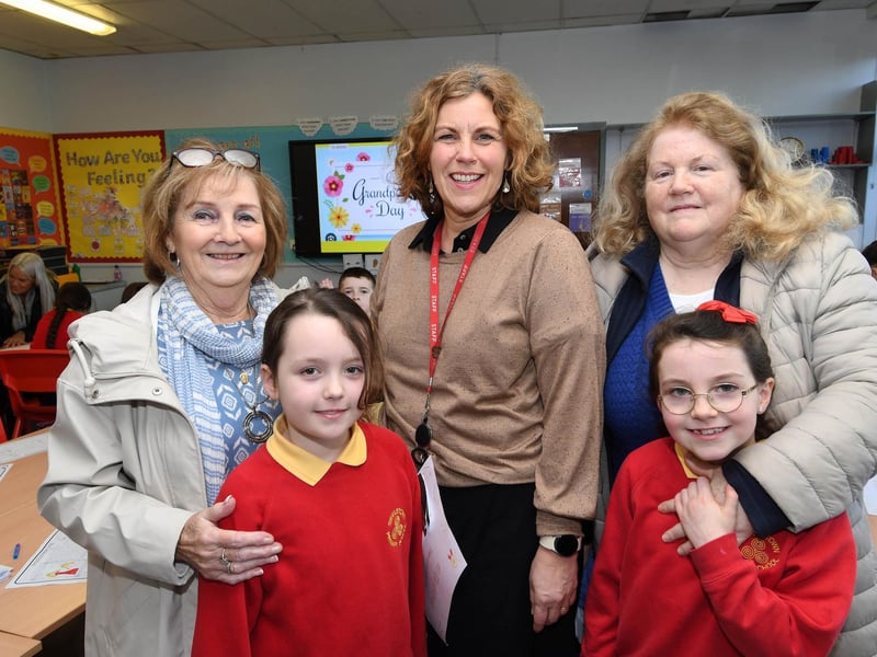 Steelstown Vice Principal Mrs. O'Neill welcoming Eimear and Evangeline's grandparents to the school.