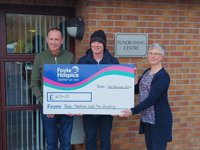 In memory of Cathy - Peter Meehan (Cathy’s Brother) and Paddy McGonigle (Brother-in-law) presenting a cheque for £1400 to June McAuley, Foyle Hospice, proceeds from a Last Man Standing Competition held in memory of Cathy McGonigle.