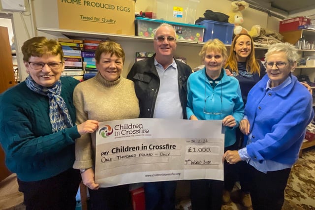 Richard Moore and Shauna O’Neill from Derry-based international development charity Children in Crossfire visited the Third World Shop in Maghera on Friday to thank them for their latest £1,000 donation. The shop has been supporting Children in Crossfire’s annual Advent Appeal for several years. 2023’s campaign focused on providing education, healthcare and nutrition for thousands of young children in Dar es Salaam, Tanzania and the Third World Shop’s kind donation will help towards that goal. Pictured with Richard Moore and Shauna O’Neill are four of the shop’s volunteers; Ann Bradley, Bernie McErlean, Marian O'Kane and Josephine Breen.
