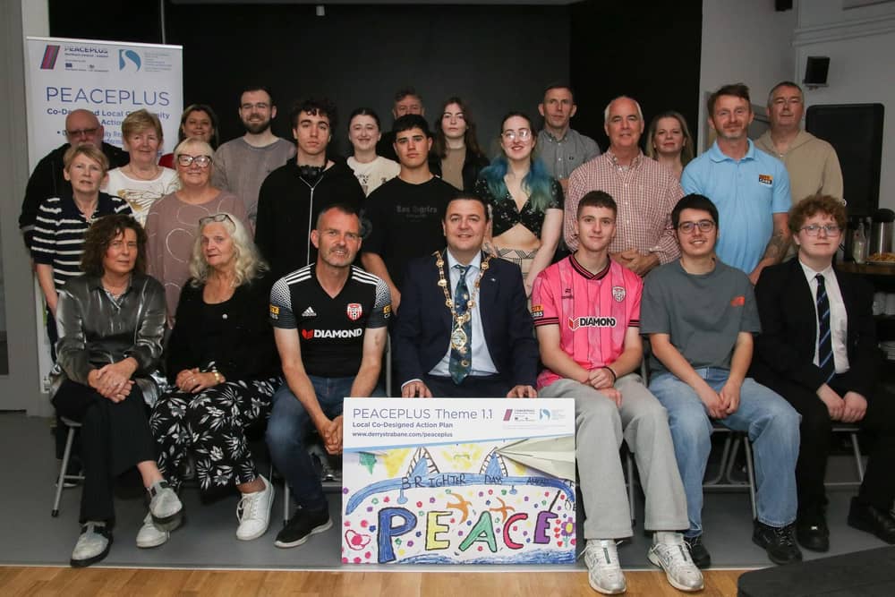 Mayor McHugh with guests at the new Gasyard Development Trust PEACEPLUS project  launch, Gasyard Centre. (Photo - Deirdre Heaney, nwpresspics)