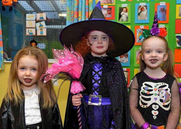 Nursery children, Breena, Jessi and Rosa, from Naiscoil Dhoire Steelstown, in Halloween costume.  Photo: George Sweeney.  DER2243GS – 070