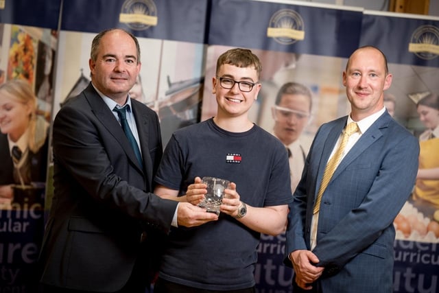 Mr Noel Mc Elholm congratulates Oliver McKibben, recipient of the Seagate Technology Award for A2 Physics. Also pictured, Mr Mark Smyth (Head of Physics).
