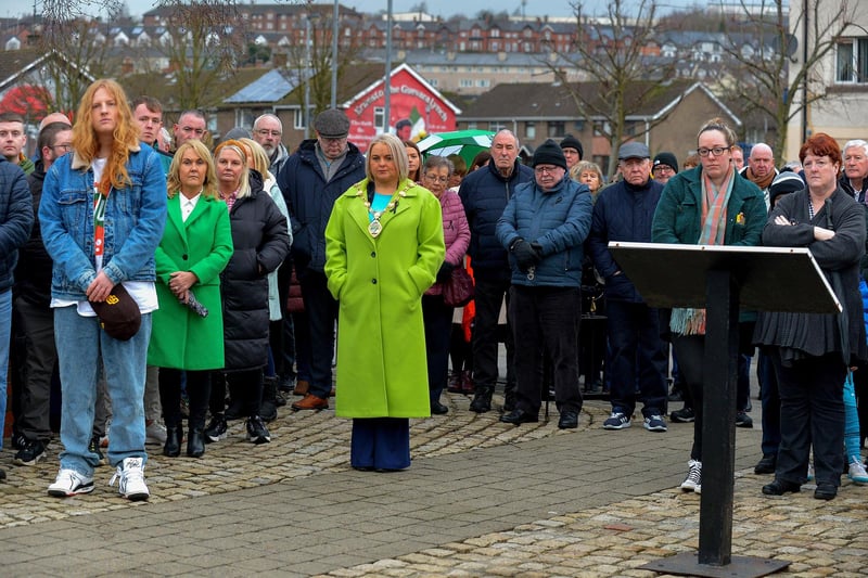 Relatives are joined by Mayor Sandra Duffy and  people at the Bloody Sunday monument at Joseph's Place on Monday afternoon for a one minute silence on the 51st anniversary of the Bloody Sunday massacre. Photo: George Sweeney. DER2306GS 42