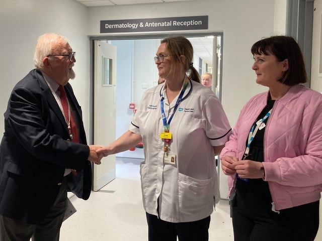 Chair of the Western Trust Board Dr. Tom Frawley in conversation with staff at the official opening of a new antenatal clinic at Altnagelvin.