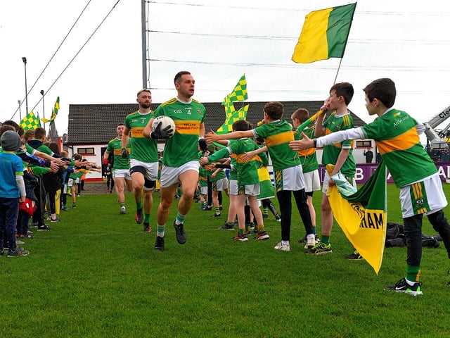 Glen players run onto the pitch at Celtic Park for their Ulster Senior Club Championship quarter- final against Errigal Ciaran on Sunday afternoon last. Photo: George Sweeney. DER2246GS – 026