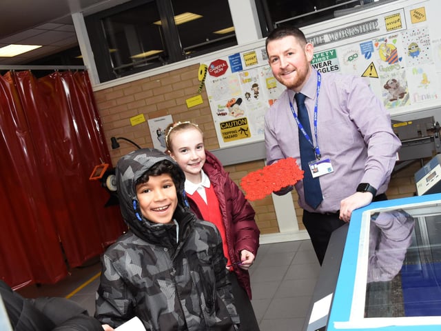 Enrique and Katie in the Technology Department with Mr McLaren during Oakgrove Integrated College Open Day on Thursday last.