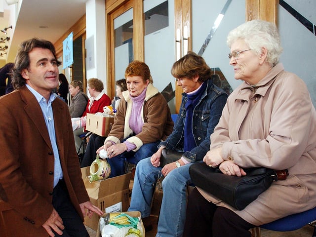 Paul Martin with some local people.