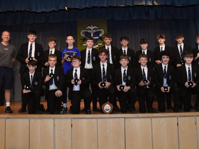 Year 9 Ennis Cup Champions 2023 pictured  at the St. Columb’s College Annual Prizegiving last week with Mr M McLaughlin, Coach and Mrs M Burns, Year Head and Senior Teacher.