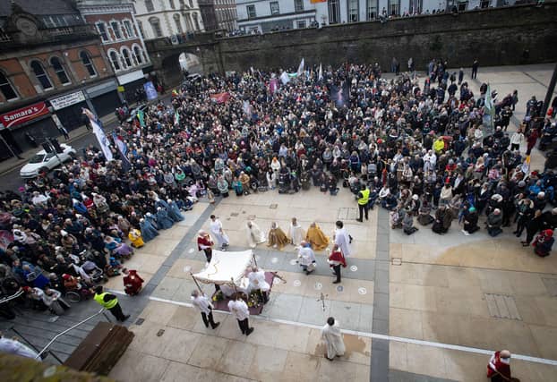 The Eucharistic Procession of the Faithful in honour of St. Brigid pictured praying the Rosary in Guildhall Square on Saturday. (Photos: Jim McCafferty Photography)