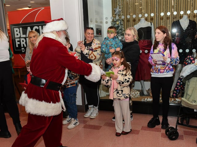 Santa arrives at the Richmond Shopping Centre on Saturday morning. Photo: George Sweeney