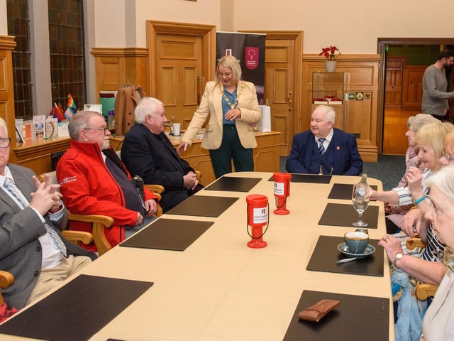 The Mayor Councillor Sandra Duffy welcomed members of the Order of Malta to the Guildhall where she presented the organisation with commemorative crystal in recognition of their contribution across the Derry City and Strabane District Council area. Picture Martin McKeown. 06.02.23:Mayor of Derry City and Strabane District Council’s reception for Knights of Malta in the Mayor’s Parlour, Guildhall on Monday 6th February.