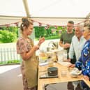 Tasha with Paul, Prue, Noel and interpretur Daryl during Pastry Week in the Bake Off tent. 