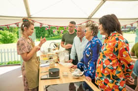 Tasha with Paul, Prue, Noel and interpretur Daryl during Pastry Week in the Bake Off tent. 