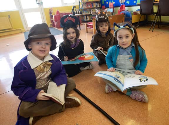 Hollybush PS pupils get in some reading during World Book Day on Thursday last.