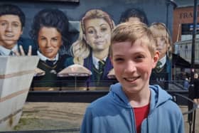 Keelan is from Glasgow, on a trip with his family. He was unsure of his favourite Derry Girls character and episode as he has only seen the first two episodes. He is hoping to watch more. His family stopped for a photo beside the mural outside Badger's Bar.