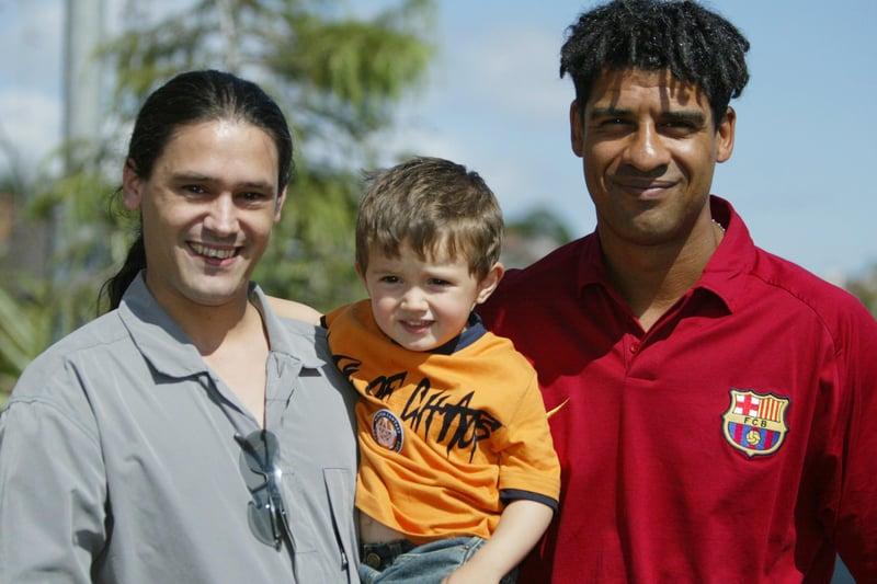 Barcelona manager Frank Rijkaard pictured with Spanard Juan Ramon Masolive and his Derry born son Marc as they welcomed the Barcelona team to Derry. (1208JB150)
