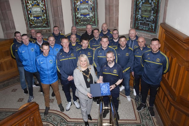 50 YEARS OF BOSCOS. . . . . .Don Boscos FC coaches pictured with Mayor Sandra Duffy at Friday night’s reception to mark the club’s 50th anniversary. Front centre is club chairperson Marty Crumley. (Photos: Jim McCafferty Photography)