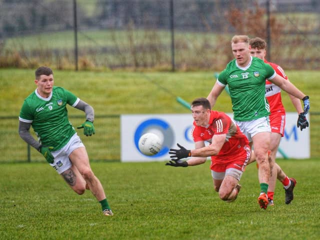 Derry's Gareth McKinless gets off a pass under pressure during Saturday's League opener against Limerick. (Photo: George Sweeney)