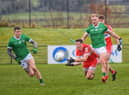 Derry's Gareth McKinless gets off a pass under pressure during Saturday's League opener against Limerick. (Photo: George Sweeney)
