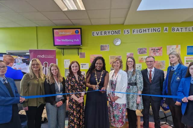 Cutting the ribbon formally opening St Mary's College Wellbeing Hub.
