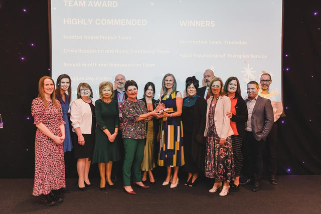 Winner in the Working Together Team Award was the COVID-19 Vaccination Team (Trustwide) pictured with Karen Hargan, Director of Human Resources & Organisation Development.