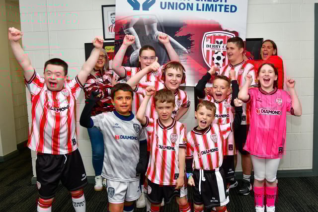 Karen Pyne (Derry City Supporters Liaison Officer) pictured the Ardnashee School and College pupils before leading the Derry City team out onto the pitch on Friday night.