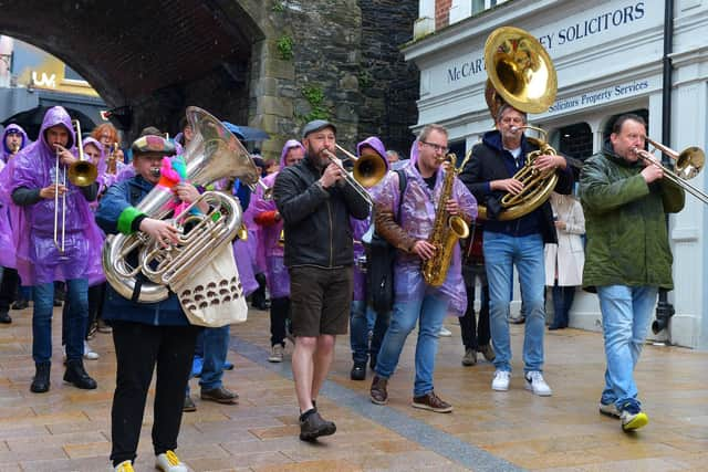 The JayDee Brass Band led the DLD Second Line Parade at the Jazz Festival on Saturday afternoon. Photo: George Sweeney.  DER2217GS – 117