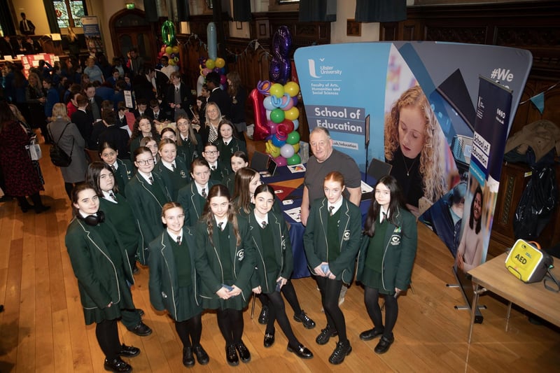 Students from St. Cecilia's College pictured at the Ulster University stall on Friday with Mr. Paul O'Hea. : .
