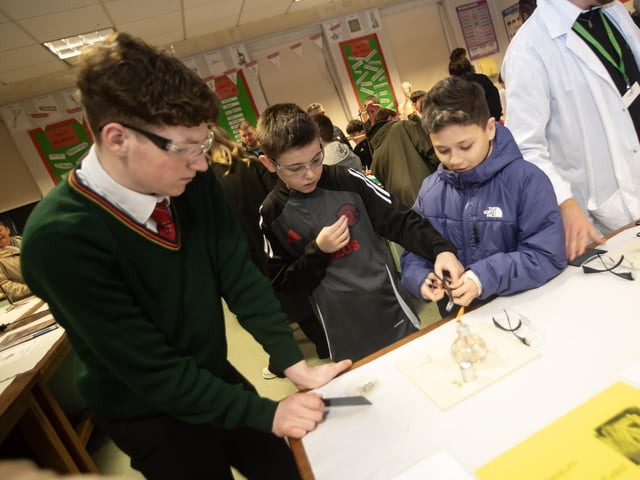 St. Joseph's student Jack Thompson pictured with Lochlainn Boyle (Sacred Heart PS) and Bobby McGowan (Good Shepherd PS) during a science experiment at the St. Joseph's Boys School Open Night on Tuesday. (Photos: Jim McCafferty Photography)