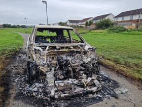 The shell of a car in Galliagh on Wednesday morning.