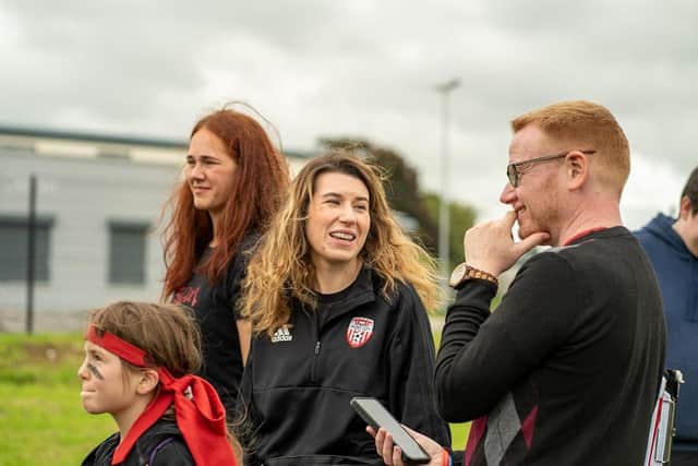 Grace with the film-makers on set in Galliagh.