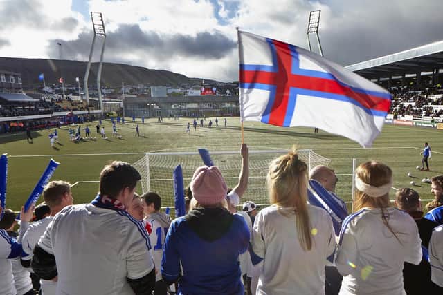 Faroe Islands fans watch on during an international game against Greece.