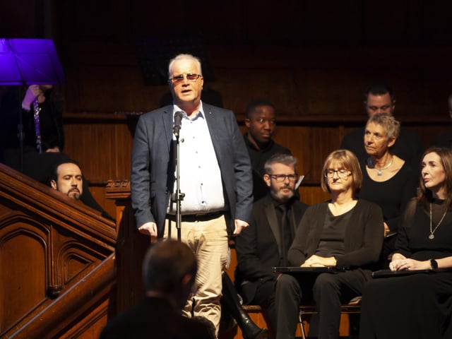 Richard Moore, Children in Crossfire gives the opening address before the start of Sunday’s ‘The Unanswered Question - Music, Poetry and Prose of Searching and Peace’ by the Irish Doctors Choir and Orchestra North-West at the city’s Guildhall.