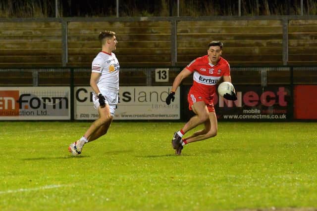 Tyrone’s Neil Devlin closes in on Derry’s Ben McCarron during the Dr McKenna Cup game at Owenbeg on Wednesday evening last.  Photo: George Sweeney. DER2302GS – 07
