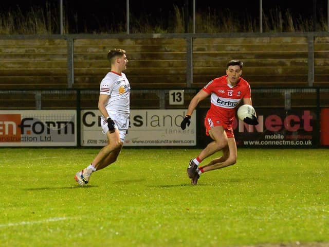 Tyrone’s Neil Devlin closes in on Derry’s Ben McCarron during the Dr McKenna Cup game at Owenbeg on Wednesday evening last.  Photo: George Sweeney. DER2302GS – 07
