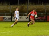 Tyrone’s Neil Devlin closes in on Derry’s Ben McCarron during the Dr McKenna Cup game at Owenbeg on Wednesday evening last.  Photo: George Sweeney. DER2302GS – 07