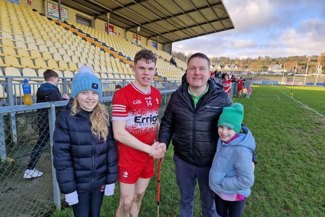 Dermot Friel of Friel's Bar, Swatragh congratulations 'Man of the Match' Cahal Murray after Derry victory over Donegal's in O'Donnell Park. Included are Ruby and Ella Friel.