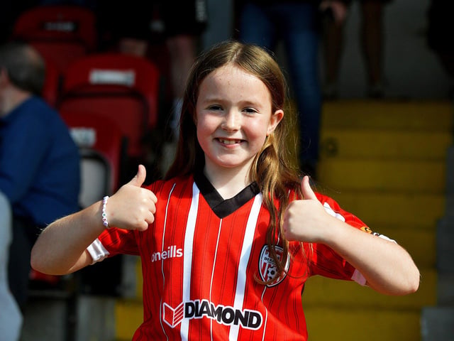 Young fan at Derry City’s game against Athlone Town on Sunday evening. Photo: George Sweeney. DER2329GS – 