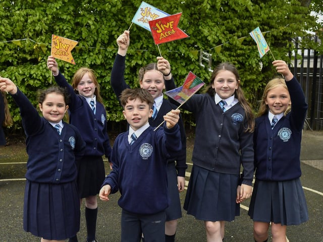 Happy pupils from Rosemount Primary School enjoy the entertainment from the Jive Aces on Thursday morning. Photo: George Sweeney